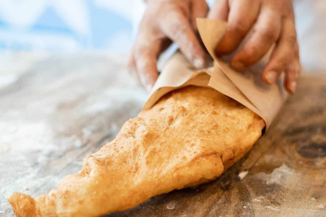 Whole golden Neapolitan pizza fritta served fresh at Pizza Fritta 180, showcasing authentic Italian street food in Sydney