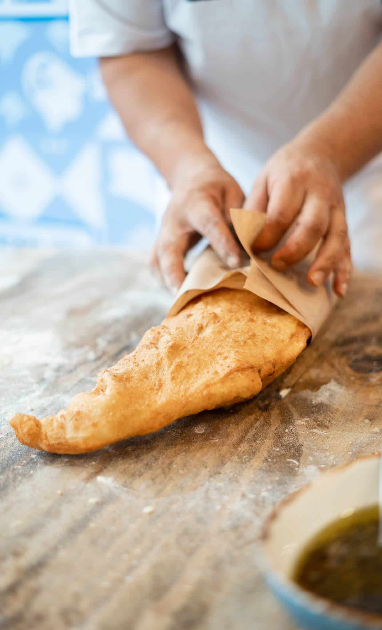 Whole golden Neapolitan pizza fritta served fresh at Pizza Fritta 180, showcasing authentic Italian street food in Sydney