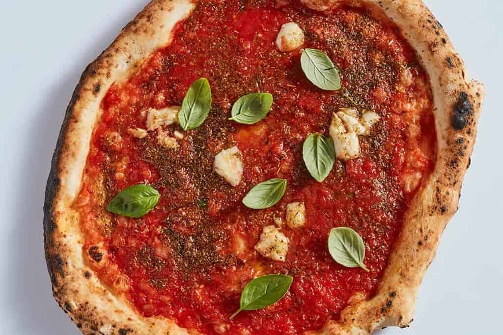 Authentic Neapolitan Marinara pizza fritta with tomato sauce, garlic, and oregano served at Pizza Fritta 180 in Sydney